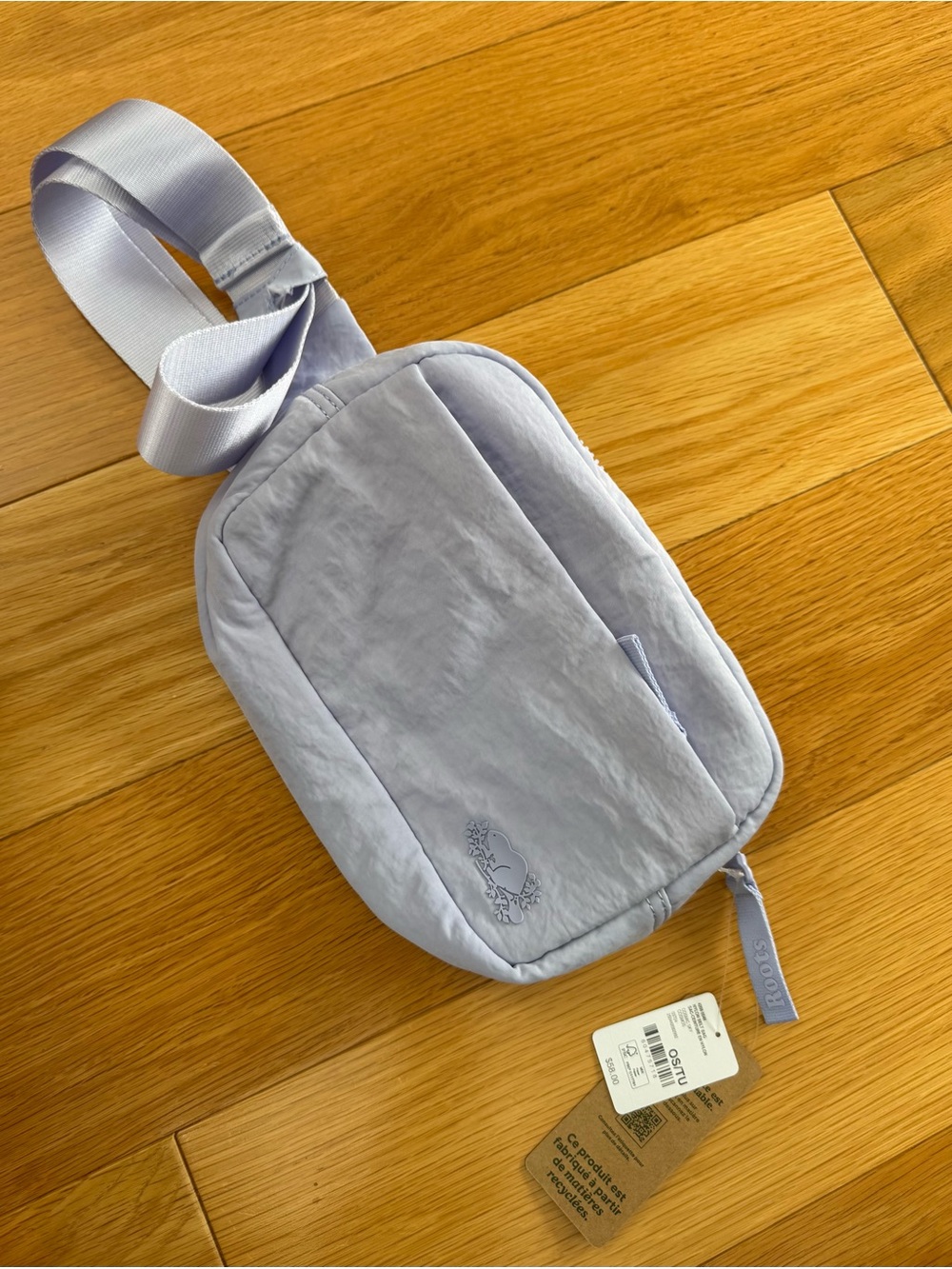Roots nylon belt bag in “cosmic sky” (light lavender)